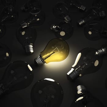 Shining lightbulb among other lightbulbs