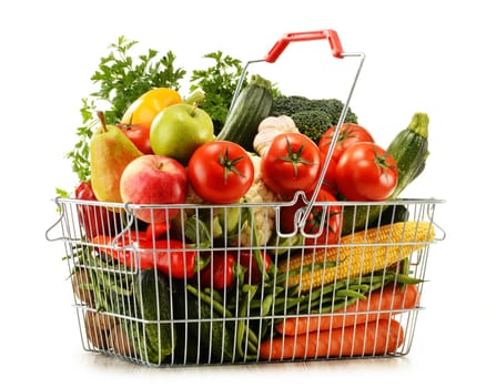 Wire shopping basket with groceries isolated on white background