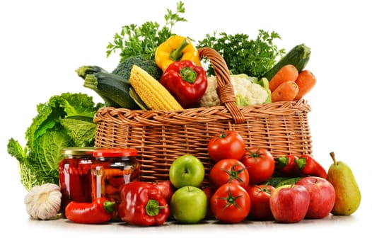 Wicker basket with groceries isolated on white background