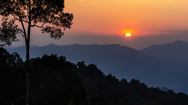 High angle view beautiful sunset over mountain range from Panoen Thung scenic point at Kaeng Krachan National Park Phetchaburi province in Thailand