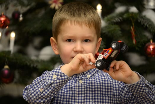 Boy on the Christmas tree