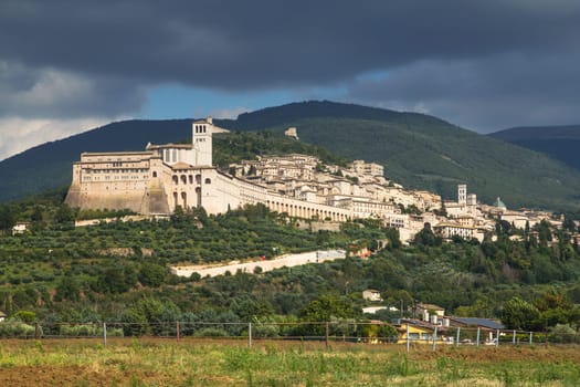 General view of Assisi with The Papal Basilica of St. Francis of Assisi (Umbria, Italy)