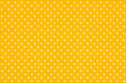 Yellow fabric with white dots