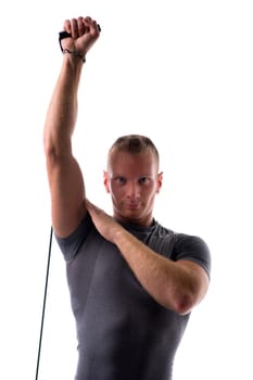 Sexy muscular man, working out with elastics, isolated on white