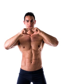 Shirtless muscular man making heart symbol with his hands on white background