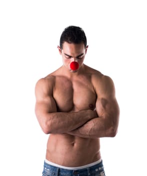 Topless Muscled Middle Age Man with Small Red Ball on Nose Isolated on White Background.