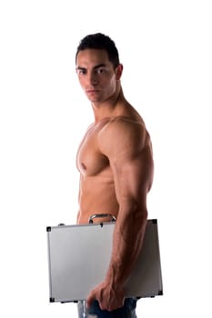 Shirtless handsome muscular young businessman with a strong physique standing sideways looking at the camera carrying a briefcase under his arm isolated on white