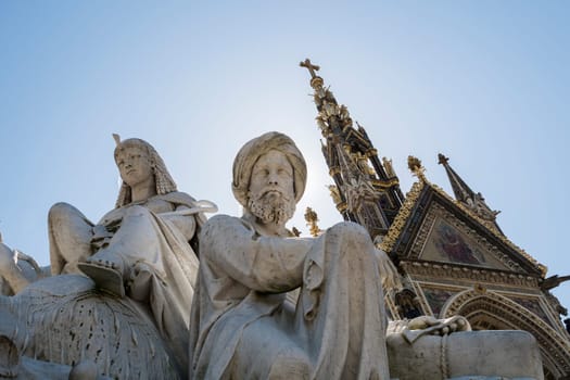 Low angle shot of African statues of the Albert Memorial in Kensington Gardens, in London. It was commissioned by Queen Victoria in memory of her late husband, Prince Alfred, and opened in 1872.
