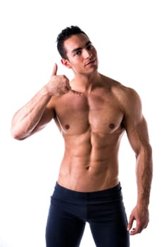Handsome male model doing call me gesture on white background