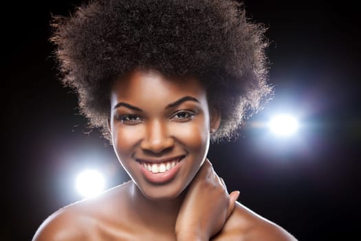 Beautiful young African woman with afro hairstyle