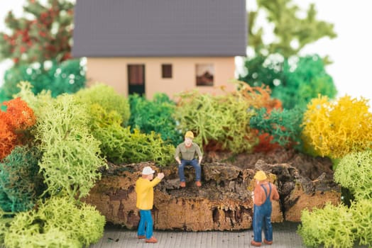 Miniature workers getting ready to renovate the house
