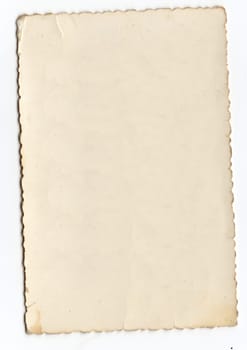 An old piece of paper with worn corners and crease marks.