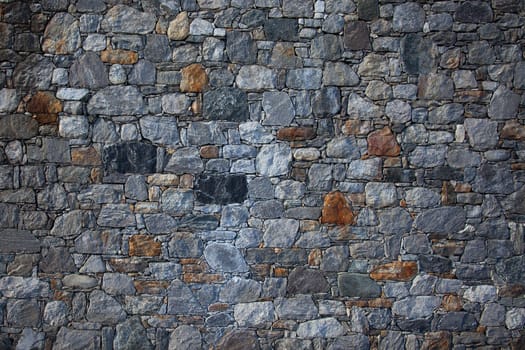 Stone wall, flat stacked background and texture