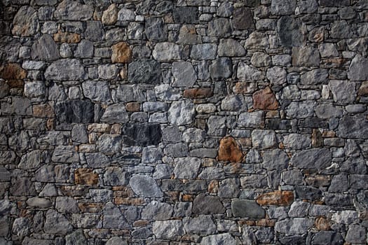 Stone wall, flat stacked background and texture