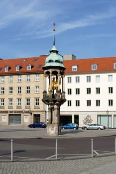 Magdeburg,Germany – September 28,2014: The golden sculpture of the Magdeburg rider at the Alte Markt on September 28,2014 in Magdeburg.