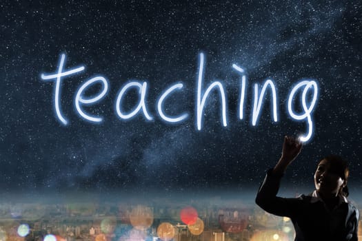 Concept of teaching, silhouette asian business woman light drawing.