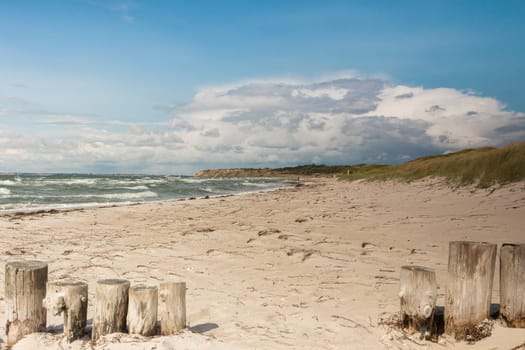 Further view of the Baltic Sea with stakes in the foreground