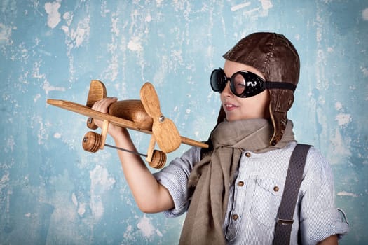 laughing boy playing - plane