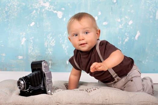 curious baby with camera