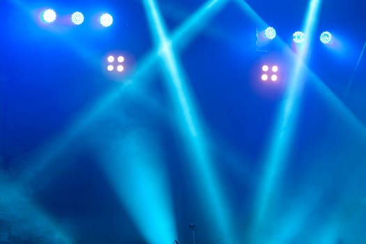 Reftector lightsi on open air stage