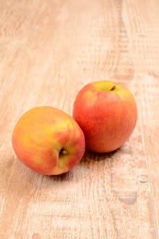 Fresh apples on a wooden table