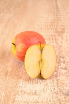 Fresh apples on a wooden table