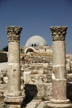 The Ruins of the citadel Jabel al Qalah in the City Amman in Jordan in the middle east.