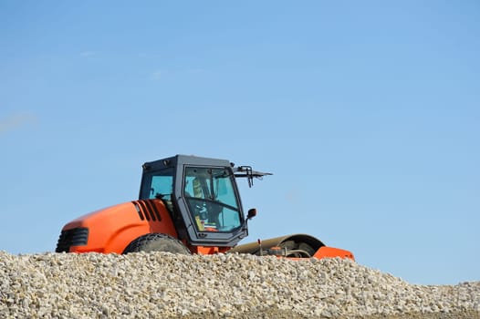Wheel roller on construction site