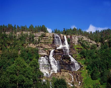 Waterfalls with forest in Norway