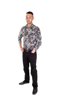 A young handsome man standing from the front in black jeans and shirt, .isolated on white background..