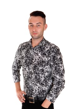 A young handsome man standing from the front in black jeans and black and .white shirt, isolated on white background..