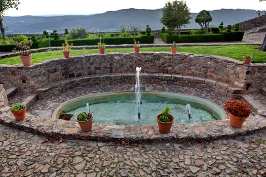 Stone fountain in the gardens of Marvao Castle, Portugal
