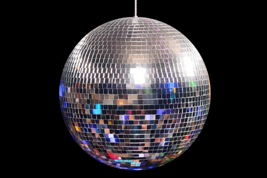 Disco Ball and happy dancing people in a disco night club