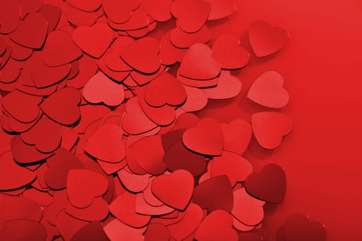 Detailed view of many small red glitter hearts