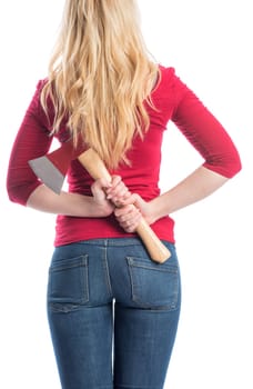 a woman holds an axe behind her back