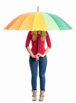 a shy woman hides under a colorful rain screen