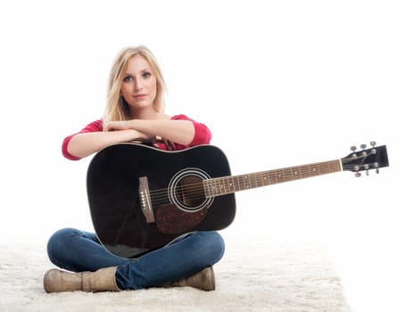 young blonde woman with guitar