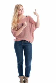 a blonde woman smiles and shows thumbs up