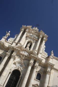 The Piazza del Domo in the old Town of Siracusa in Sicily in south Italy in Europe.