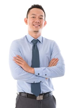 Confident  Asian business man smiling, standing isolated over white background.