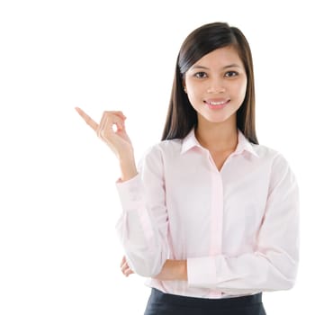 Young mixed race pan Asian business woman pointing on copy space isolated  on white background