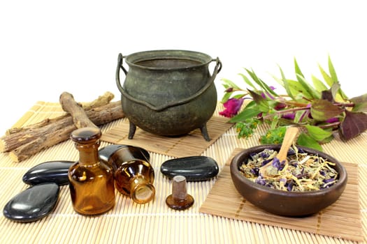 a cup of herbal tea and Chinese herbs