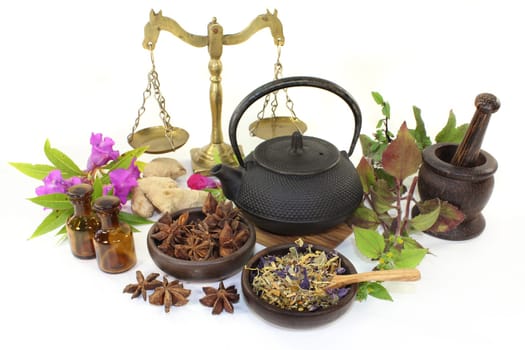a cup of herbal tea and Chinese herbs