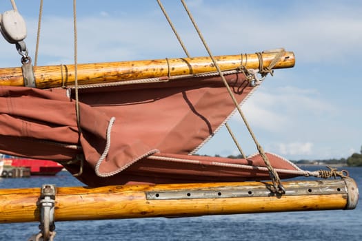 Large tree and gaffe of a large sailing ship in the port of Svendborg,Fyn,Denmark