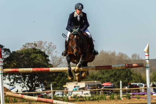 Horse Jumping Nationals Championship  scenes and close-up action of riders men woman at Shongweni Hillcrest outside Durban South Africa  10th Aug 2014