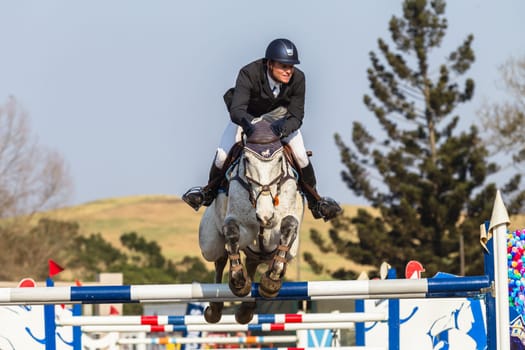 Horse Jumping Nationals Championship  scenes and close-up action of riders men woman at Shongweni Hillcrest outside Durban South Africa  10th Aug 2014