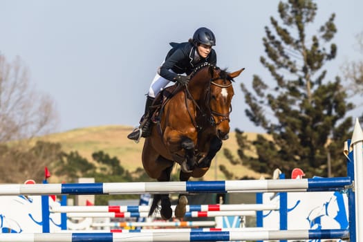 Horse Jumping Nationals Championship  scenes and close-up action of riders men woman at Shongweni Hillcrest outside Durban South Africa  10th Aug 2014