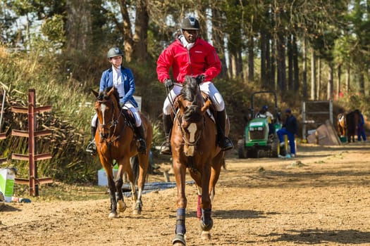 Horse Jumping Nationals Championship  scenes and close-up action of riders men woman at Shongweni Hillcrest outside Durban South Africa  10th Aug 2014