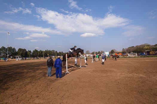 Horse Jumping Nationals Championship  scenes and close-up action of riders men woman at Shongweni Hillcrest outside Durban South Africa  10th Aug 2014