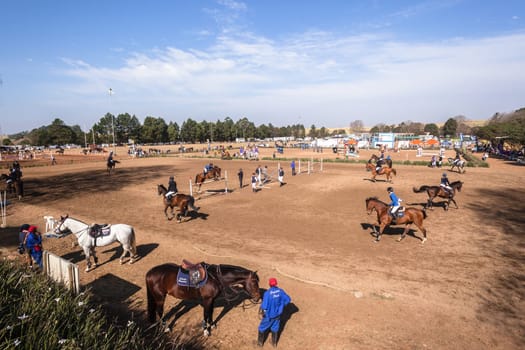 Horse Jumping Nationals Championship  scenes and close-up action of riders men woman at Shongweni Hillcrest outside Durban South Africa  10th Aug 2014